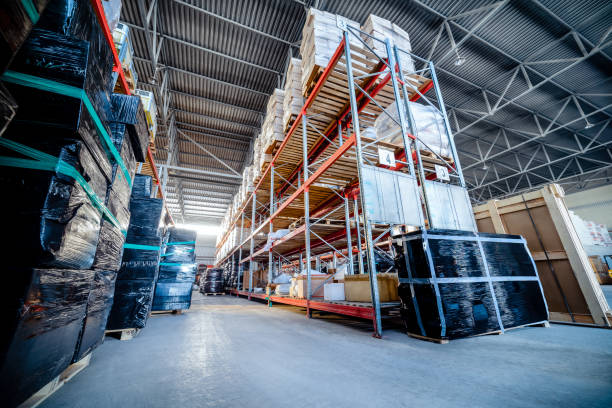 istock Long shelves with a variety of boxes and containers 692461686