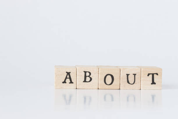 istock wooden cube written as ABOUT,word made with building blocks. 692466204