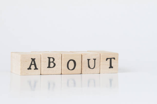 istock wooden cube written as ABOUT,word made with building blocks. 692466232