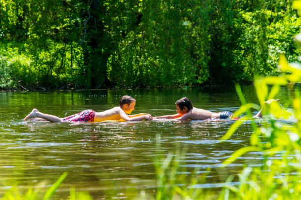 istock Loving the swimming hole 692476010