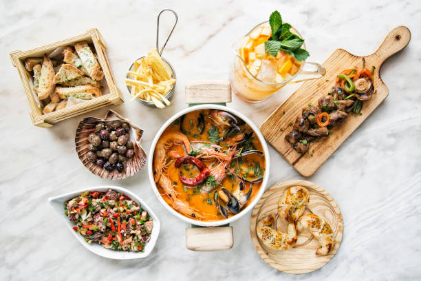 istock mixed fresh seafood selection gourmet set meal on table 692476524