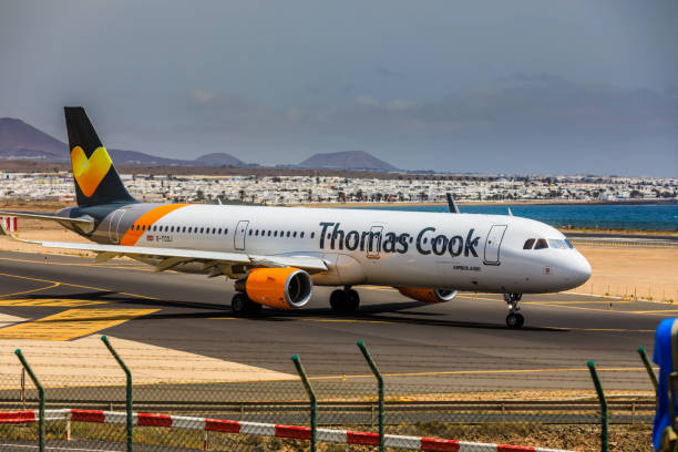 Lanzarote Airport ARECIFE, SPAIN - APRIL, 15 2017: AirBus A321 of Thomas Cook with the registration G-TCDJ ready to take off at Lanzarote Airport sunexpress stock pictures, royalty-free photos & images
