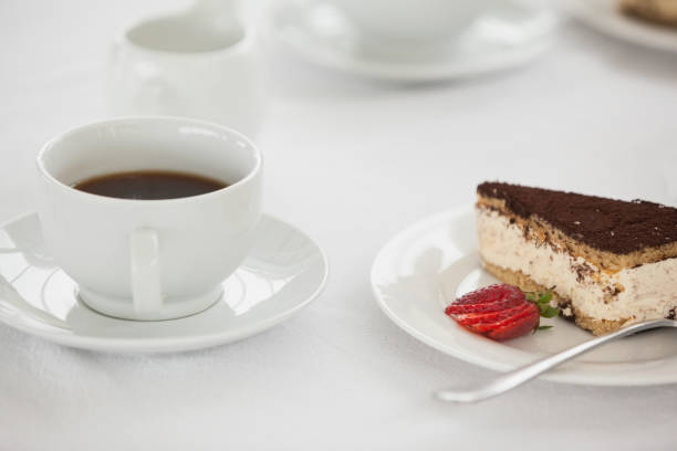 istock Cup of coffee and desert 692476890