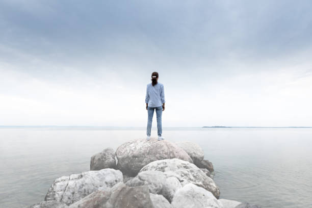 istock Woman on rock 692479766
