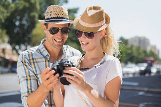 istock Hip young couple looking at their camera 692482610