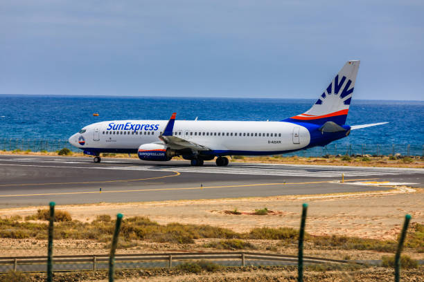 Lanzarote Airport ARECIFE, SPAIN - APRIL, 15 2017: Boeing 737 - 800 of SunExpress with the registration D-ASXR ready to take off at Lanzarote Airport sunexpress stock pictures, royalty-free photos & images