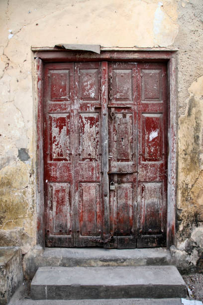 istock Old wooden door at Stone Town 692495256
