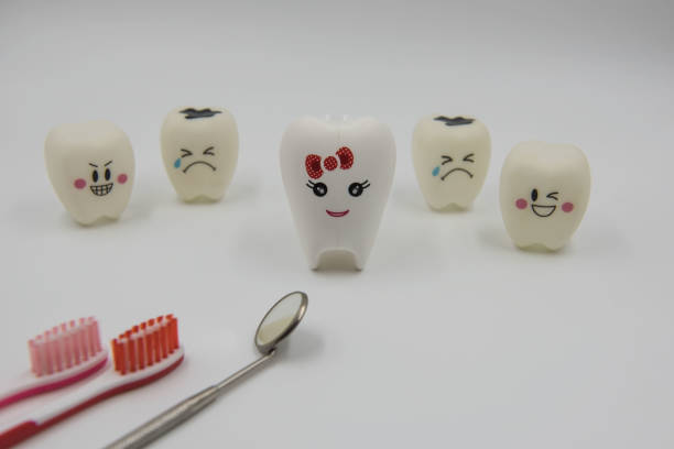 istock Model  lady smile Cute toys teeth in dentistry 692496152