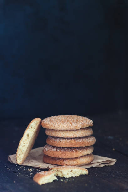 istock Stack of cookies on a dark background, retro style, vintage 692502418