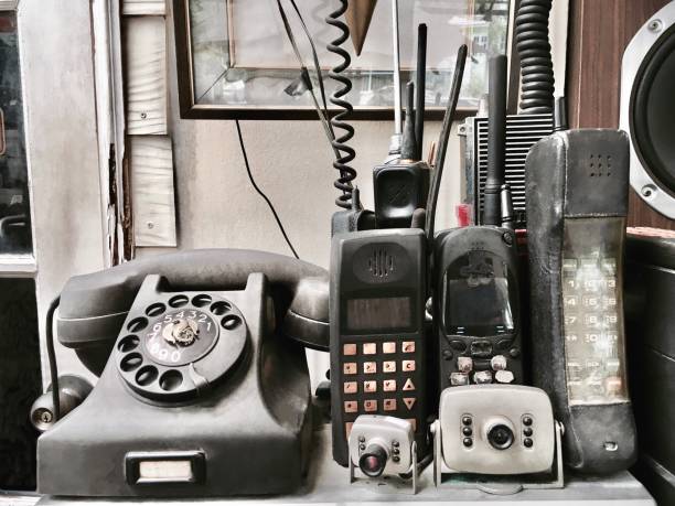 Collection of Old Classic Retro Telephone with Old Style Cellular Mobile Phone.