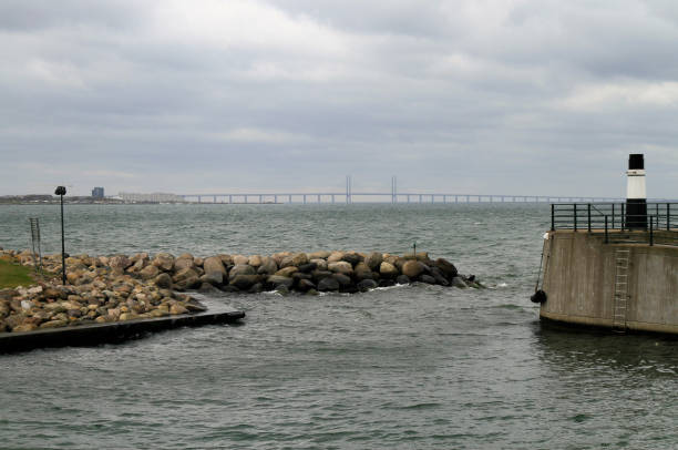 istock stony pier against the bridge between Sweden and Denmark 692512934