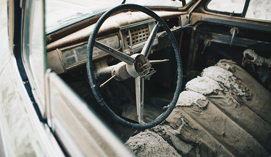 Interior of the old vintage car and steering wheel