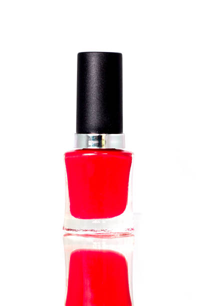 istock Red color nail polishOn a white background 692516008
