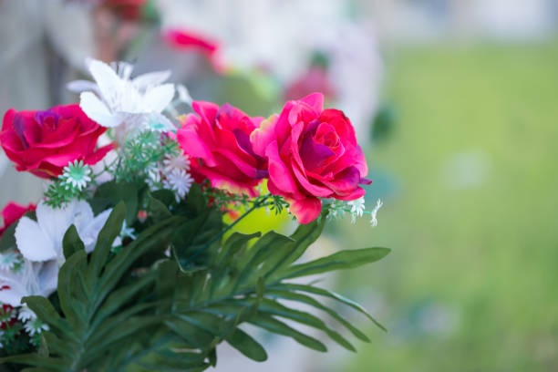 Detail of a bouquet of flowers in a cemetery