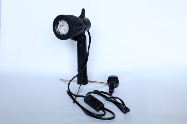 istock a black photographer's lamp on a tripod for a light box 692526562
