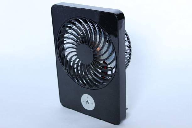 istock a portable and rechargeable black refreshing fan 692526598