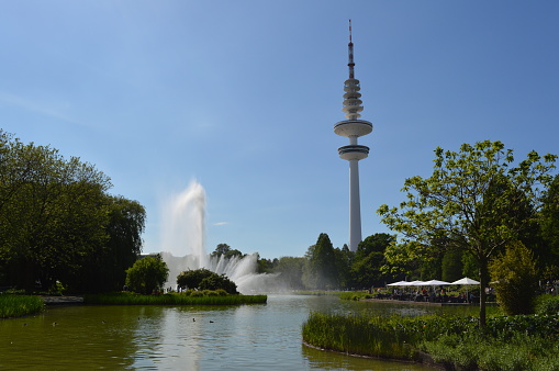 City park in Hamburg with a view of the Heinrich-Hertz-Turm.