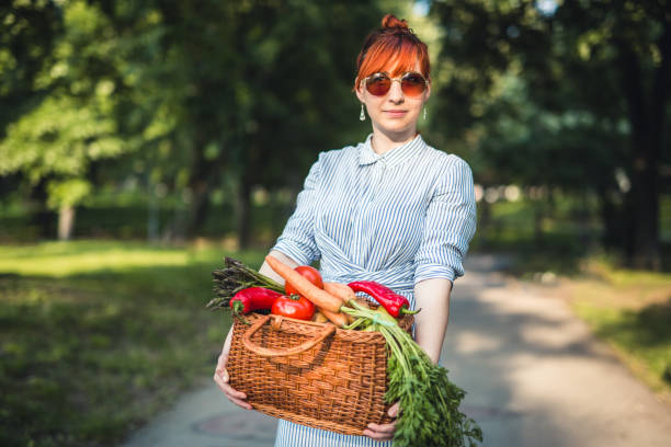 istock Young hipster woman gardening 692529528