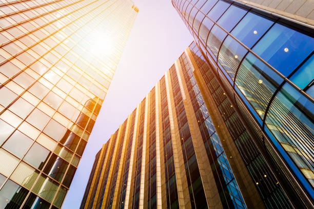 istock Cityscape featuring modern office exterior from a low angle at sunset. 692532942