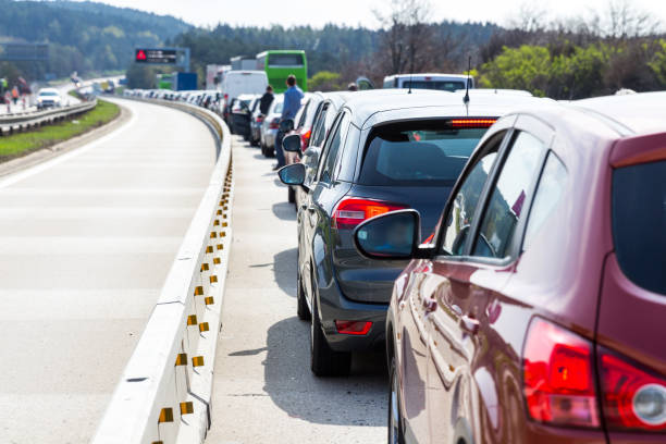 istock Cars on highway in traffic jam 692533040