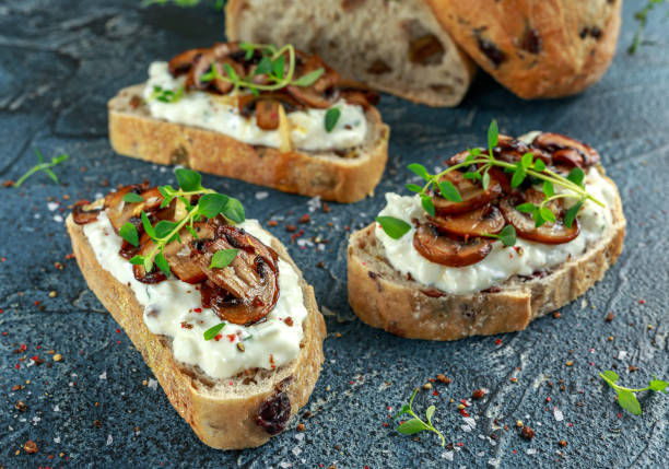 istock Garlic mushroom toast with creamy herbed ricotta chees spread 692533232