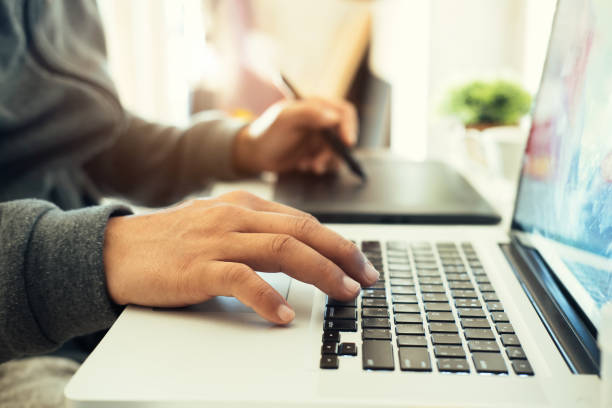 Creative and Designer Concept. Man using Graphic tablet. Creative and Designer Concept. Man using Graphic tablet. graphic design studio stock pictures, royalty-free photos & images
