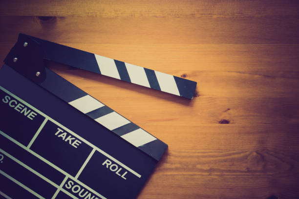 istock movie clapper on wood table 692553292