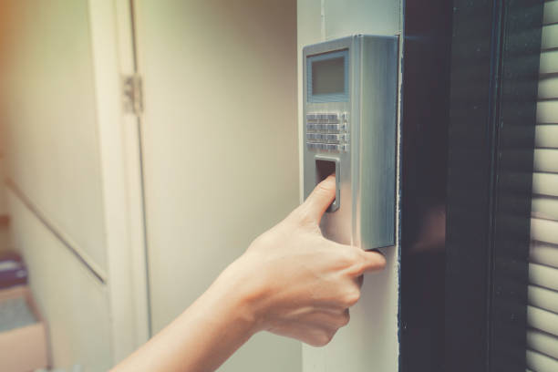 istock fingerprint and access control in a office building 692553406