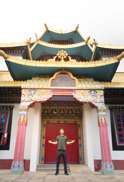 istock Men Meditating at Buddhist Temple. 692553446