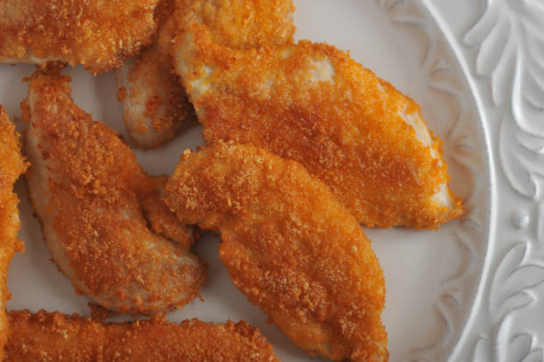istock background of chicken nuggets in bowl top view 692560694
