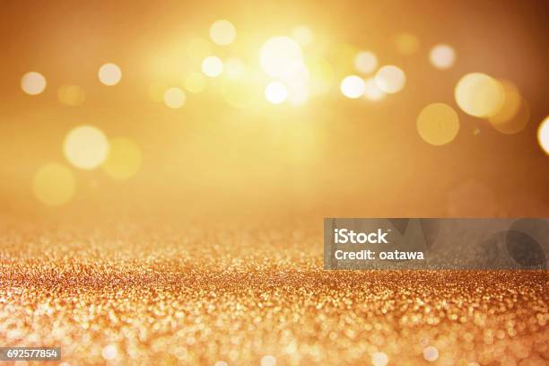 Gold Glitter Lights Bokeh Background Stock Photo - Download Image Now - Backgrounds, Gold Colored, Christmas