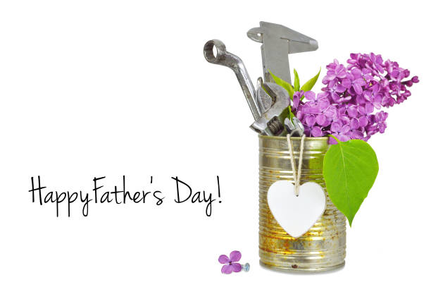 istock Happy Fathers Day card with tools in rusty can isolated on white background 692580952