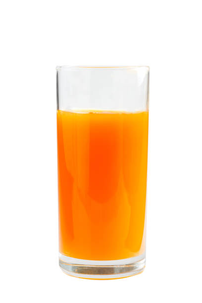 istock Fresh carrot juice glass. Isolated on white background 692581438