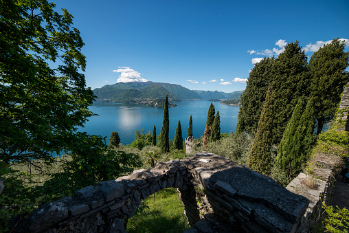 Varenna, Italy - May 9, 2017: Panoramic view of Lake Como and the promontory of Bellagio from the castle of Vezio