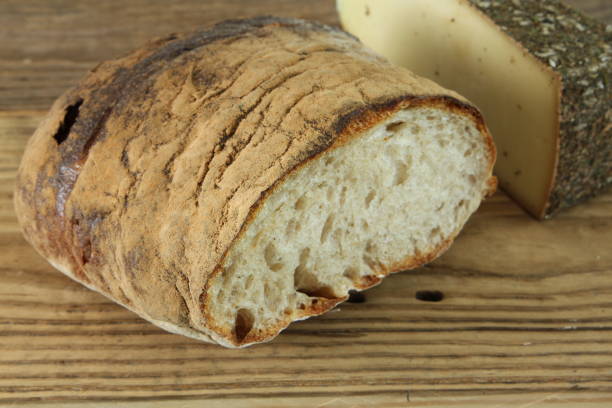 istock Traditional Swiss cheese with homemade bread 692591196