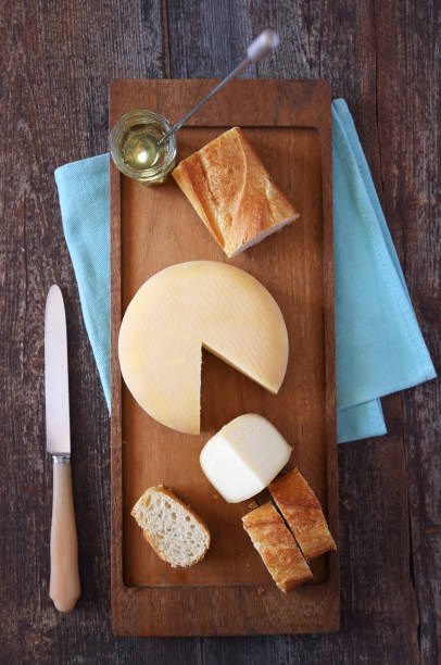 istock Cheese, baguette and honey 692594064