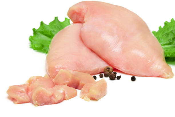 istock Top view of raw chicken fillet chunks isolated on white 692596920