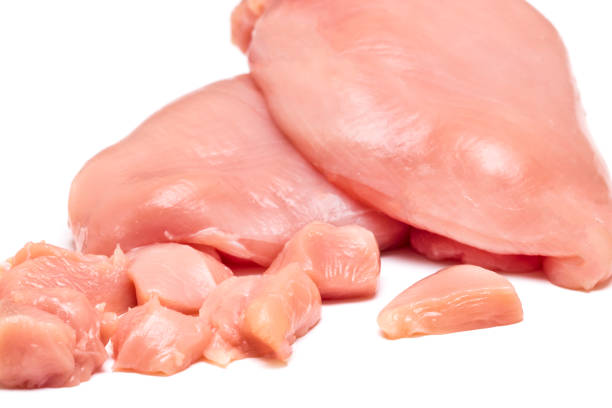 istock Top view of raw chicken fillet chunks isolated on white 692596926