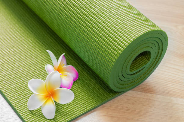 istock yoga mat with flowers 692599252