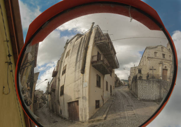 istock SMALL ITALIAN TOWN IN A MIRROR 692605510