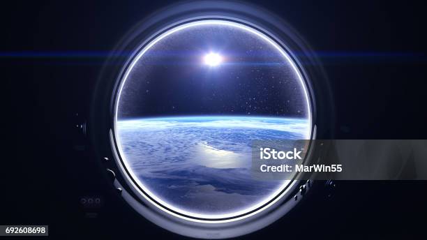 Flight Of The Space Station Above The Earth International Space Station Is Orbiting The Earth Earth As Seen Through Round Window Of Iss The Sun In The Window Of The Spacecraft Starry Sky Nasa Stock Photo - Download Image Now