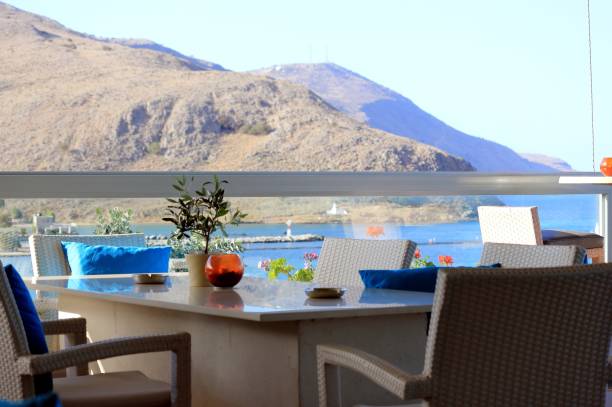 istock The interior of a summer bar. Windows with sea panorama. 692609928