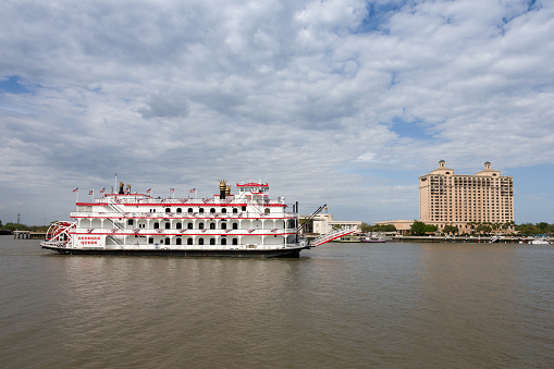 Savannah, GA - March 27, 2017:  The Georgia Queen is an 1800s style paddlewheel riverboat and tourist attraction in historic Savannah, Georgia.  It can accommodate up to 1000 passengers and is the newest member of the Savannah Riverboat Cruise fleet.