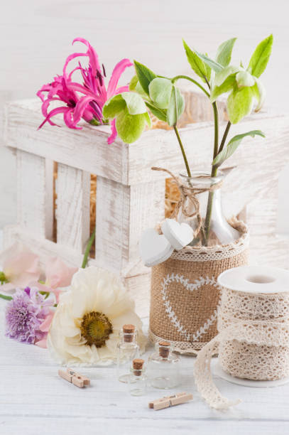 istock Wooden box with lilly and flowers 692617496