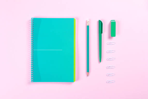 istock flat lay with various school supplies on colorful surface 692618262