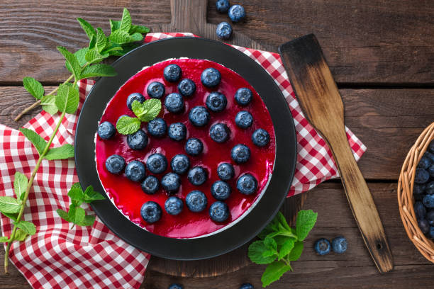istock Blueberry cake with fresh berries and marmalade, cheesecake 692621564