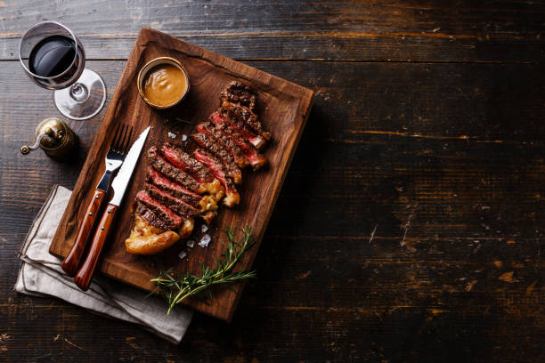 istock Grilled sliced Steak Striploin with Pepper sauce 692634584