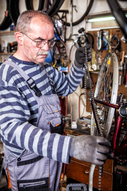 istock Senior mechanic in his factory 692635142