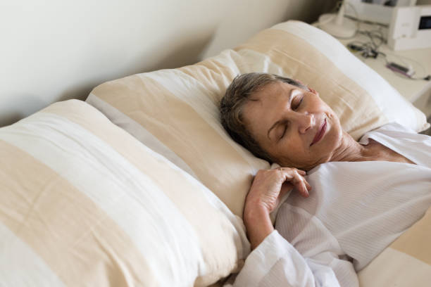 istock Elderly woman sleeping from above 692647998