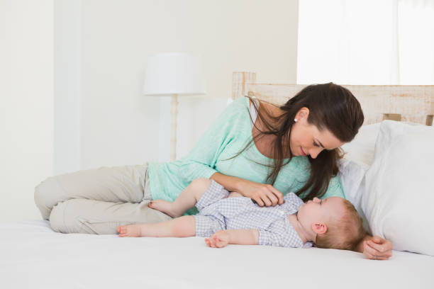 istock Happy mother with her baby boy 692661346